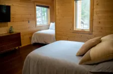 Cozy sleeping area with plush pillows and warm blankets, perfect for chilly Wisconsin nights.
