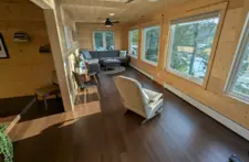 Cozy second-floor seating nook, perfect for watching the sunset over Eagle River lakes from an elevated vantage point.