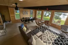 Warm and inviting interior at Smile Awhile, showing a relaxing seating area designed for ultimate comfort during your Wisconsin getaway.
