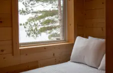 Quiet and peaceful guest room at our Eagle River property, designed for ultimate relaxation.