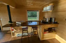 Clean and stylish upstairs living room interior at Smile Awhile, designed to highlight the natural beauty of the Northwoods.