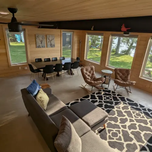 Comfortable bedroom in a vacation rental with lake view in Eagle River.