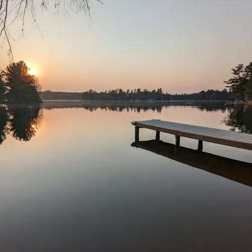 Beautiful sunset view over the lake from a rental property in Eagle River.