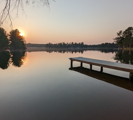 Securely fenced property at our lakefront rental, providing a safe and private environment for kids to play and guests to relax in nature.